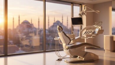 A pristine, modern dental clinic room with an empty treatment chair in the foreground. Through a large window, the background shows a softly blurred, iconic sunrise view of the Istanbul, Turkey skyline.