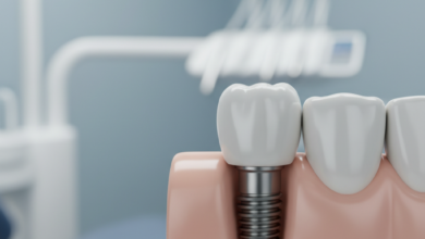 Close-up, photorealistic image of a perfectly integrated dental implant with a natural-looking ceramic crown emerging from healthy, pink gum tissue. The focus is sharp on the tooth and gum line, with a blurred, sterile, and modern dental office background. The image conveys strength, durability, and advanced dental technology.